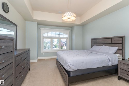 Recessed ceiling with an ornamental flush mount light fixture - 3503 Watson Point(E), Edmonton, AB 