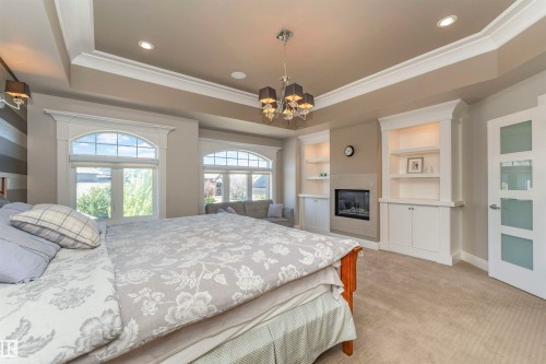 Recessed ceiling with crown molding and integrated lighting - 3503 Watson Point(E), Edmonton, AB 