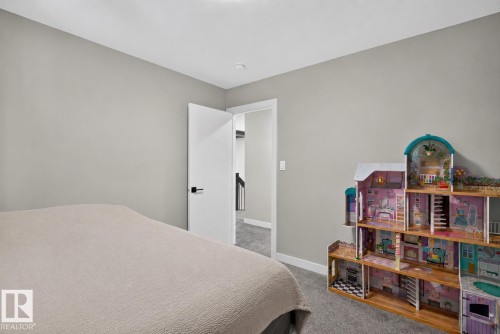 Neutral-toned walls complement plush carpet flooring - 1573 Esaiw Place, Edmonton, AB 