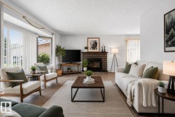 Bright living area featuring wood-finish flooring, a brick fireplace with a dark-stained mantel, and a bay window with vertical blinds - 