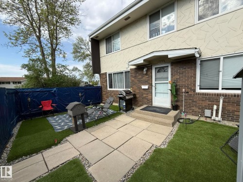 GREAT FRONT YARD WITH ARTIFICIAL TURF! - 166 Roseland Village, Edmonton, AB - Outdoor With Exterior