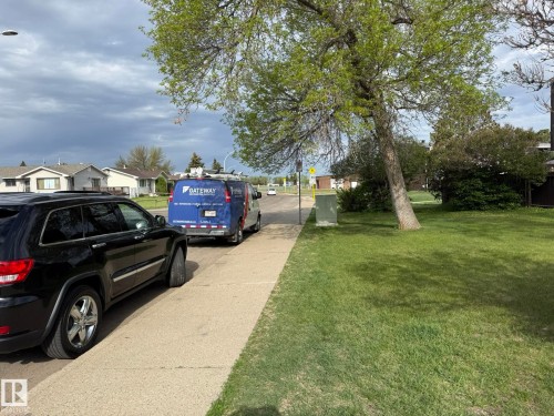 HERE IS YOUR PARKING AREA RIGHT OUT THE SIDE OF YOUR CORNER UNIT #166 ON 140 AVE. & 88 STREET! - 166 Roseland Village, Edmonton, AB - Outdoor