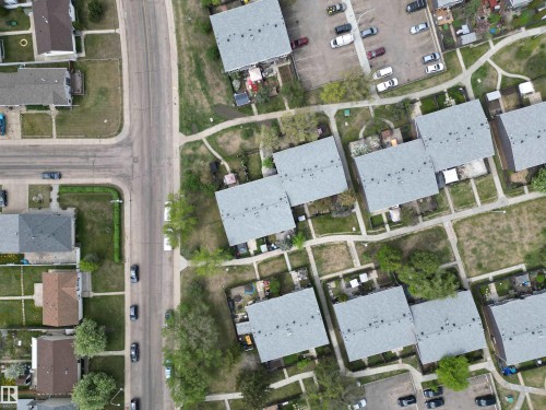 Neighborhood aerial showcasing multiple residential structures with gray shingle roofing - 166 Roseland Village, Edmonton, AB - Other
