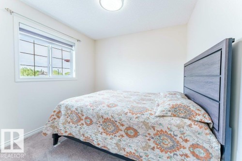 Room with light-toned walls, a double window with blinds, and recessed ceiling lighting - 3525 22 Street, Edmonton, AB - Indoor Photo Showing Bedroom