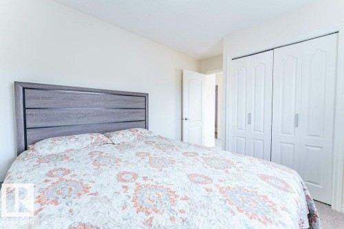 Bright room featuring light-colored walls and textured ceiling - 3525 22 Street, Edmonton, AB - Indoor Photo Showing Bedroom