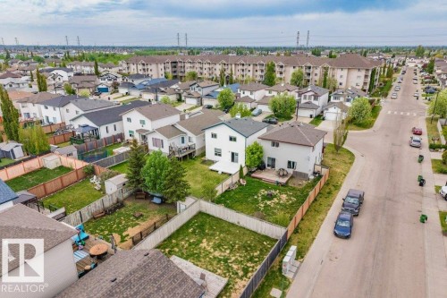 Residential neighborhood featuring a variety of detached homes with fenced backyards - 3525 22 Street, Edmonton, AB - Outdoor With View