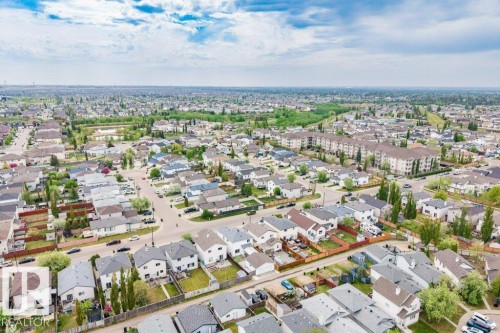 Aerial perspective showcasing a residential area with varied housing styles - 3525 22 Street, Edmonton, AB - Outdoor With View