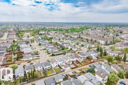 Aerial perspective showcasing a residential area with varied housing styles - 