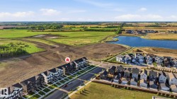 Aerial perspective showcasing a developing community with varied housing styles - 