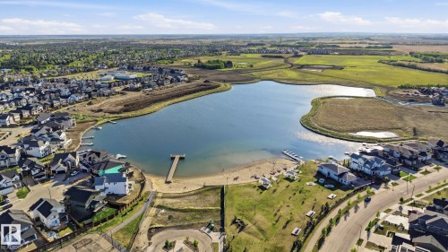 Lakefront community featuring a private beach and dock access - 58 Jensen Gate, St. Albert, AB 