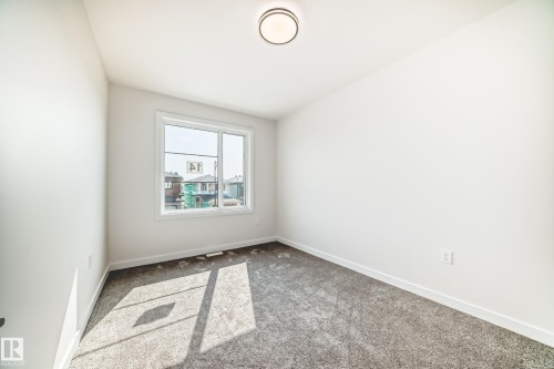 Empty room - 14 Tenuto Link, Spruce Grove, AB - Indoor Photo Showing Other Room