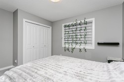 Room featuring neutral gray walls and white trim - 