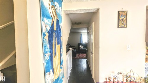Hall featuring dark wood-style flooring - 704 Abbottsfield Road, Edmonton, AB - Indoor