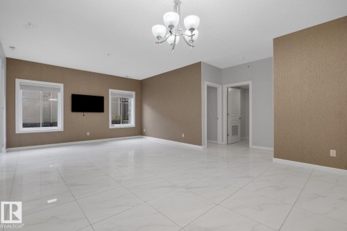 Empty room - 105 160 Magrath Road, Edmonton, AB 
