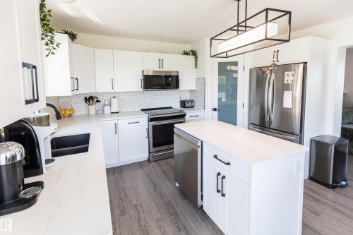 90 22111 Twp Rd 510, Rural Leduc County, AB - Indoor Photo Showing Kitchen With Stainless Steel Kitchen With Double Sink