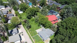 Expansive lot featuring mature trees and established greenery - 