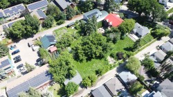 Expansive lot featuring mature trees and green spaces - 