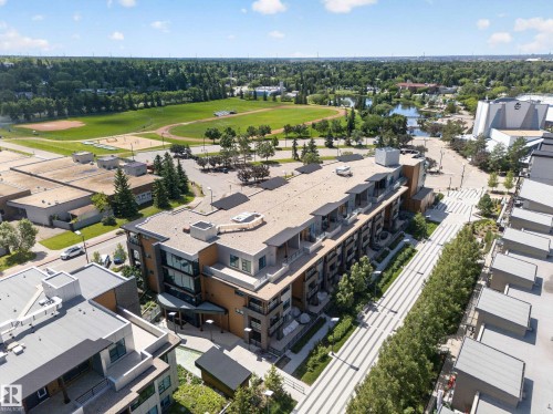 Contemporary multi-story building featuring balconies and a modern facade - Sherwood Park, AB 