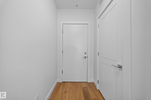 White interior doors with brushed chrome hardware - Sherwood Park, AB 