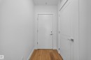 White interior doors with brushed chrome hardware - Sherwood Park, AB 