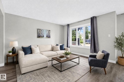 Virtually staged - 5828 65 Street, Beaumont, AB - Indoor Photo Showing Living Room