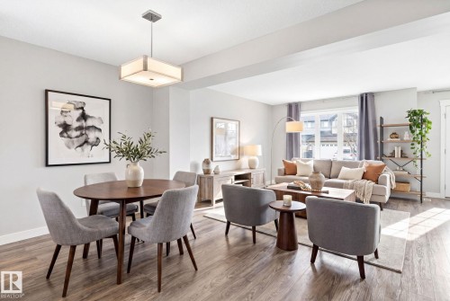 Virtually staged - 5828 65 Street, Beaumont, AB - Indoor Photo Showing Dining Room