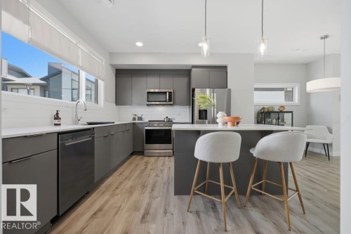 #64 50 Ebony Bv, Sherwood Park, AB - Indoor Photo Showing Kitchen With Upgraded Kitchen