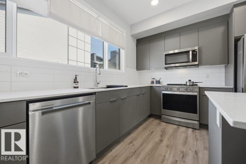 #64 50 Ebony Bv, Sherwood Park, AB - Indoor Photo Showing Kitchen With Upgraded Kitchen