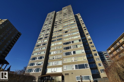 Multi-story residential tower featuring a concrete facade and numerous windows across multiple levels - 1805 10011 123 Street, Edmonton, AB 