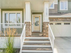 Savor your morning coffee on the front deck and soak in the peaceful quiet of this low-traffic cul-de-sac. - 