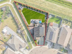 Backing onto serene greenspace with a walking trail along one side — just one neighbor and expansive natural surroundings to enjoy all four seasons. - 