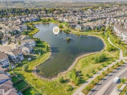 A vast network of scenic walking and running paths right at your doorstep, weaving through some of Edmonton's safest and most family-friendly neighborhoods. - 