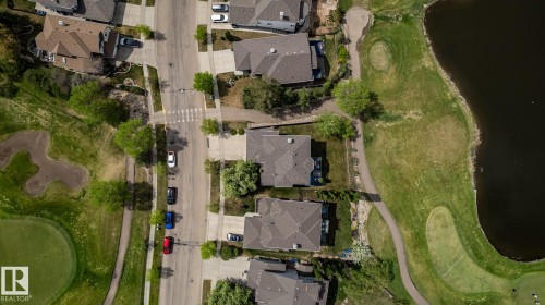 Golf course views from almost every window - this aerial perspective shows the home and the neighbourhood - 114 Reichert Drive, Beaumont, AB 