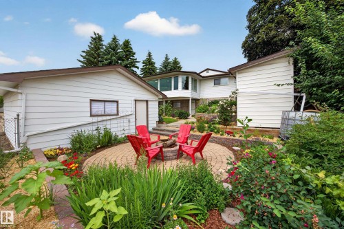 Circular paver patio with a central fire pit - 3411 103 Avenue, Edmonton, AB 