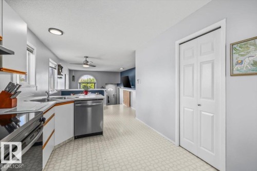 9916 93 Street, Fort Saskatchewan, AB - Indoor Photo Showing Kitchen With Double Sink