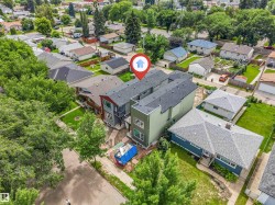 Contemporary multi-level property with an asphalt shingle roof - 