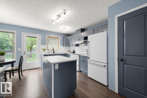 Kitchen Virtually Staged - #28 290 Spruce Ridge Rd, Spruce Grove, AB - Indoor Photo Showing Kitchen