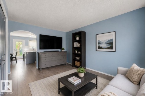 Virtually Staged - #28 290 Spruce Ridge Rd, Spruce Grove, AB - Indoor Photo Showing Living Room