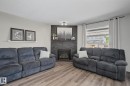 172 Galloway Wynd, Fort Saskatchewan, AB  - Indoor Photo Showing Living Room With Fireplace 