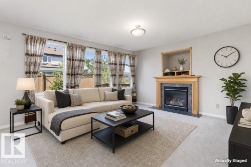 1710 Hodgson Place, Edmonton, AB - Indoor Photo Showing Living Room With Fireplace