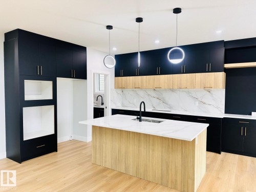 8912 Mayday Way Sw, Edmonton, AB - Indoor Photo Showing Kitchen With Upgraded Kitchen