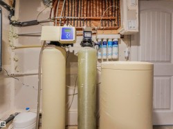 Comprehensive water treatment system featuring multiple tanks and filtration units - 