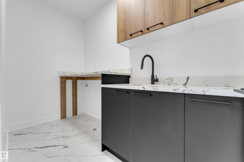 213 Basin Court, Leduc, AB - Indoor Photo Showing Kitchen