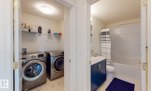 6859 Evans Wynd, Edmonton, AB - Indoor Photo Showing Laundry Room