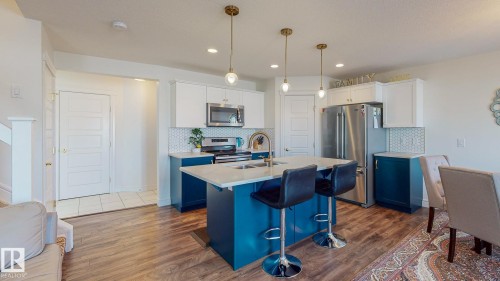 6859 Evans Wynd, Edmonton, AB - Indoor Photo Showing Kitchen With Stainless Steel Kitchen With Double Sink With Upgraded Kitchen