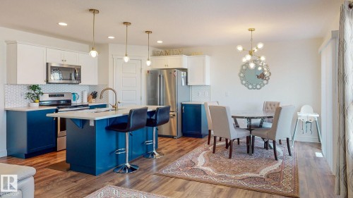 6859 Evans Wynd, Edmonton, AB - Indoor Photo Showing Kitchen With Stainless Steel Kitchen With Upgraded Kitchen