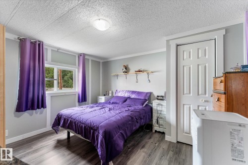 #9 305 Calahoo Rd, Spruce Grove, AB - Indoor Photo Showing Bedroom