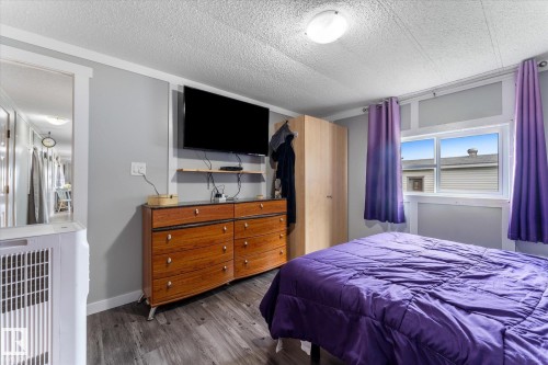 #9 305 Calahoo Rd, Spruce Grove, AB - Indoor Photo Showing Bedroom