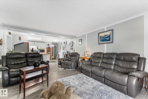#9 305 Calahoo Rd, Spruce Grove, AB - Indoor Photo Showing Living Room