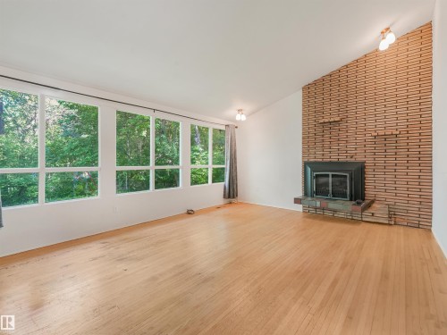 10904 100 Avenue, Fort Saskatchewan, AB - Indoor Photo Showing Living Room With Fireplace
